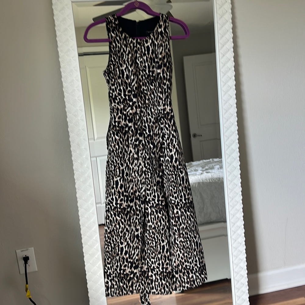 Banana republic leopard jumpsuit with bow, tie, and pockets. Size petite zero.